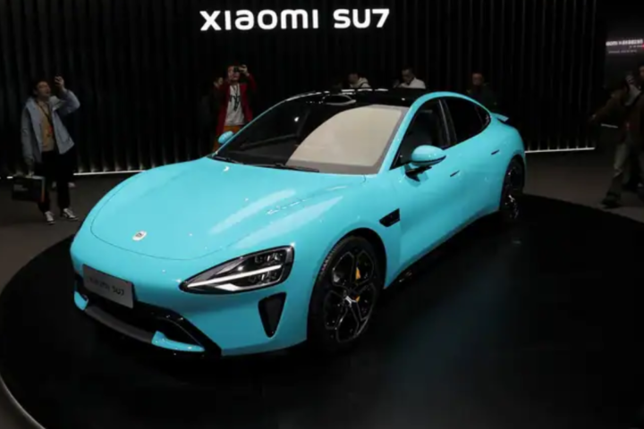 Xiaomi's CEO unveiled plans for the company's first EV, the SU7, which aims to provide a blend of aesthetics.