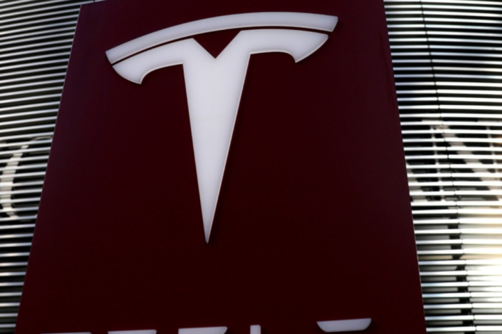 Martin Eberhard expressed unhappiness with the automaker's decision to abandon plans for a low-cost automobile.